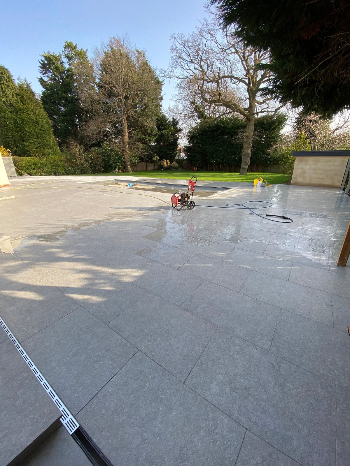 Outdoor porcelain patio with garden views